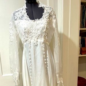Vintage wedding dress. Sheer long sleeve. Great for theater productions.
